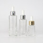 Transparent square glass cosmetic essential oil bottle with electroplated  silicone dropper cap