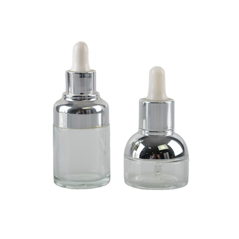 Clear glass bottle with rubber dropper for essential oil and lotion