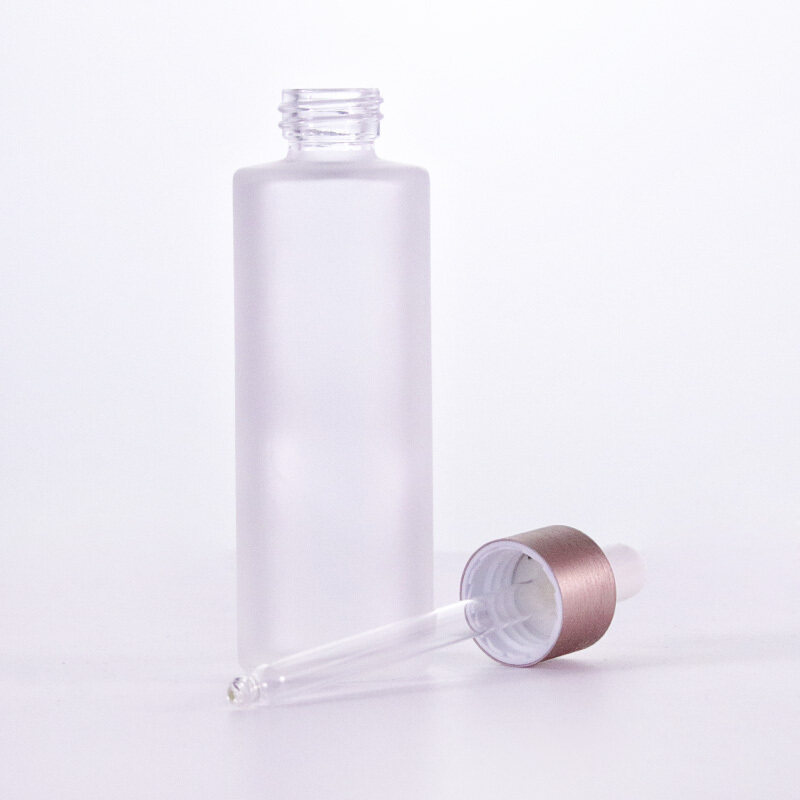 Wholesale high quality 50ml frosted transparent glass bottle with luxury rose gold brushed aluminium dropper