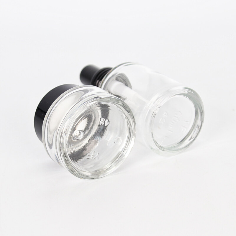 Factory clear sloping shoulder glass bottle and cream glass jar transparent glass bottle and jar