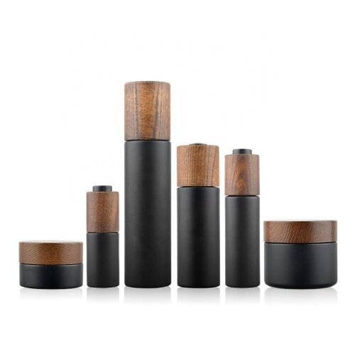 2020 New developed luxury cosmetic packaging set frosted black glass bottle and jar with ashtree wooden cap