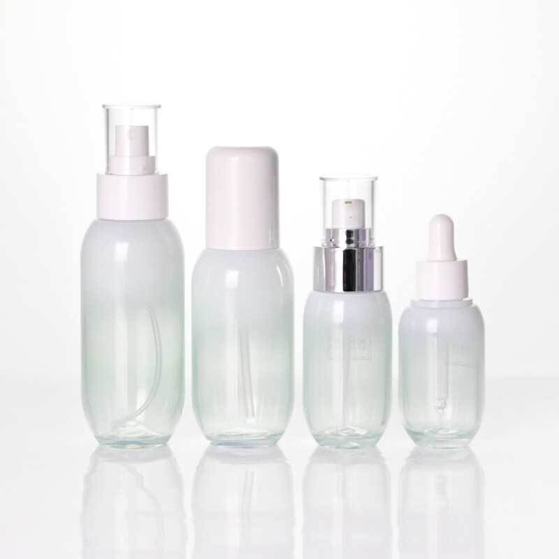 New Arrival painted plastic skin care bottles gradient green color with lotion pumps cosmetic containers and packages