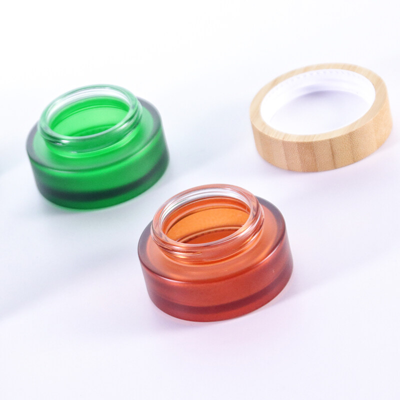 Different color skincare cosmetic skin care packaging cosmetics glass jar cream empty frosted 50ml with bamboo lid wooden cap