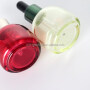 Colored glass essential oil bottle with droppers bulb shape small size serum bottle customization