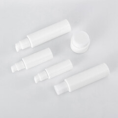 Wholesale skin care lotion bottle opal white cosmetic glass bottles with white sprayer cap