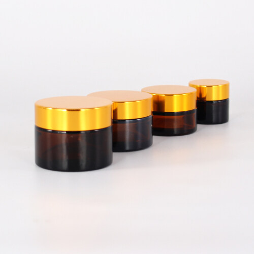 2021 new series natural brown glass bottle and jar cosmetic amber glass jar with gold lid