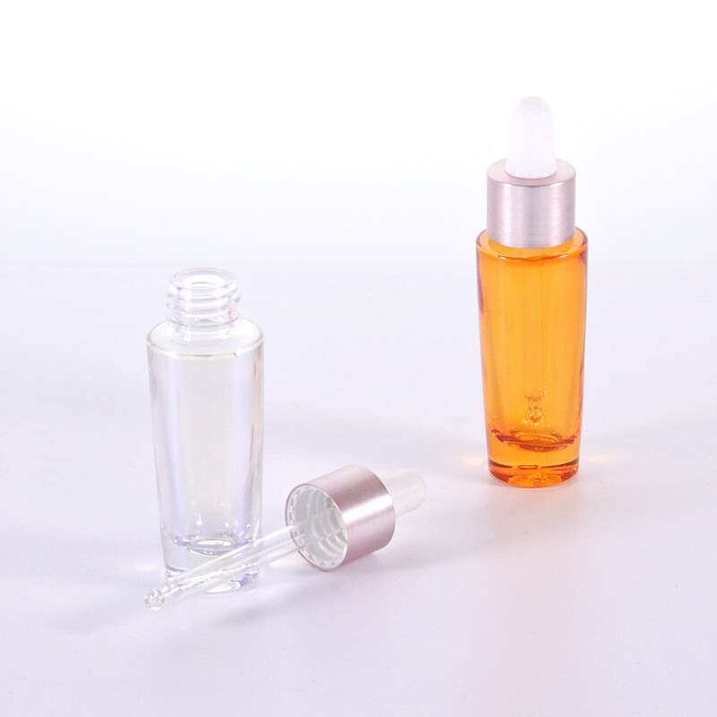 Luxury customized 20ml glass cosmetic bottles with silver caps glass dropper bottles for skin care serum essential oils
