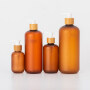 Amber matte Hot Sale 250ml  Plastic Bottle With Bamboo Pump Cap Matte Texture Cosmetic Perfume Shampoo Bottle