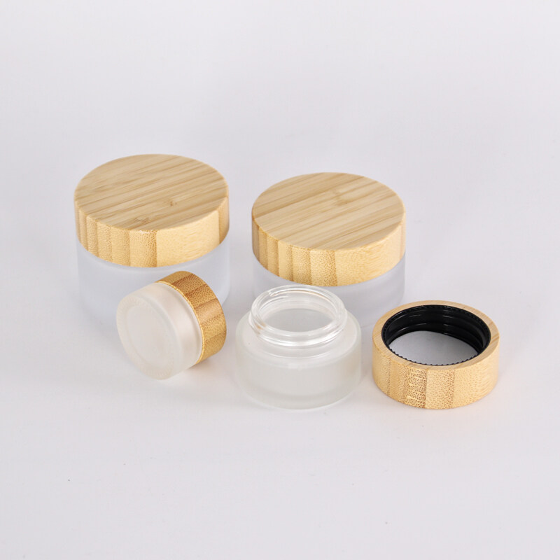 Hot sale luxury 5g 15g 30g 50g 100g 2oz 4oz bamboo cosmetic packaging frosted cream glass jars with bamboo lid