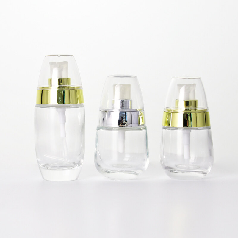 Egg-shaped transparent glass empty bottle press type lotion dispensing spray bottle