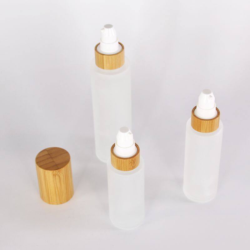 Nice 50ml custom Frosted Glass Cosmetic Bamboo Cap Perfume Bottle With bamboo Spray lid Glass Pump Bottles for Cosmetics