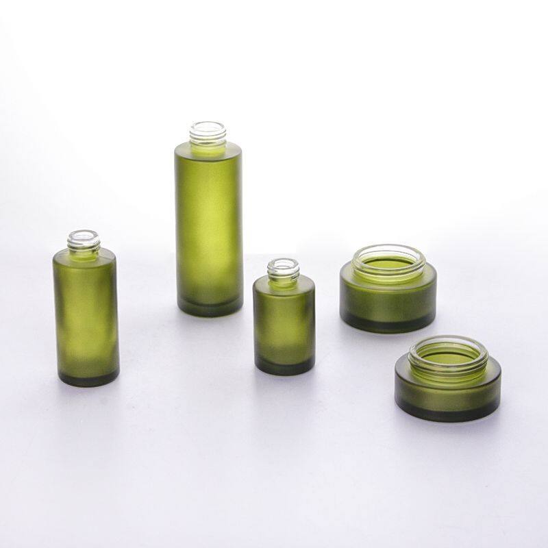 Environmentally different size 50ml 100ml flat shoulder green frosted glass lotion cosmetic bottle with ash tree wooden top