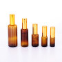 Amber glass lotion pump bottle amber serum glass bottle with gold aluminum pump