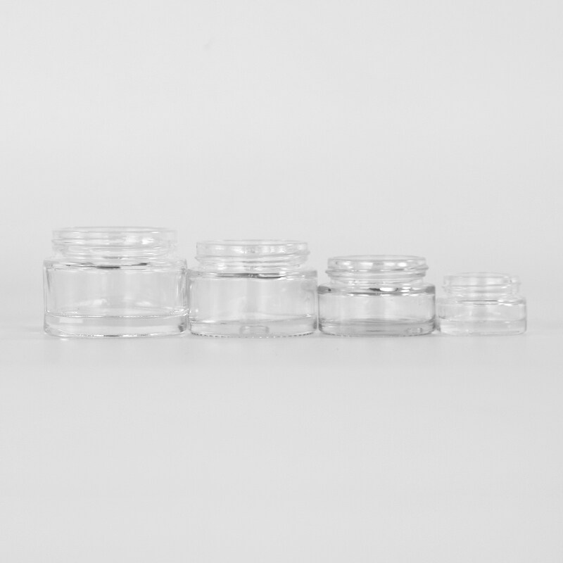 clear child resistant cosmetic glass jar with childproof cap for face cream packaging custom glass jars