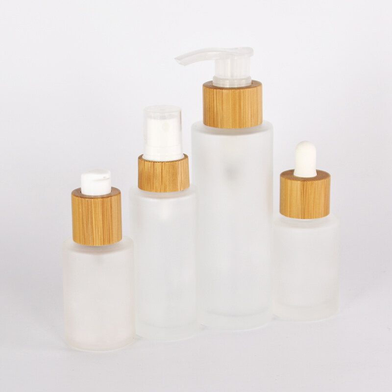 Empty 30ml 50ml 100ml 120ml 150ml clear matte Frosted empty glass cosmetic shampoo bottle with bamboo pump lotion spray lid