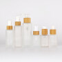 100% eco-friendly cosmetic packaging bamboo pump glass bottle bamboo sprayer glass bottle