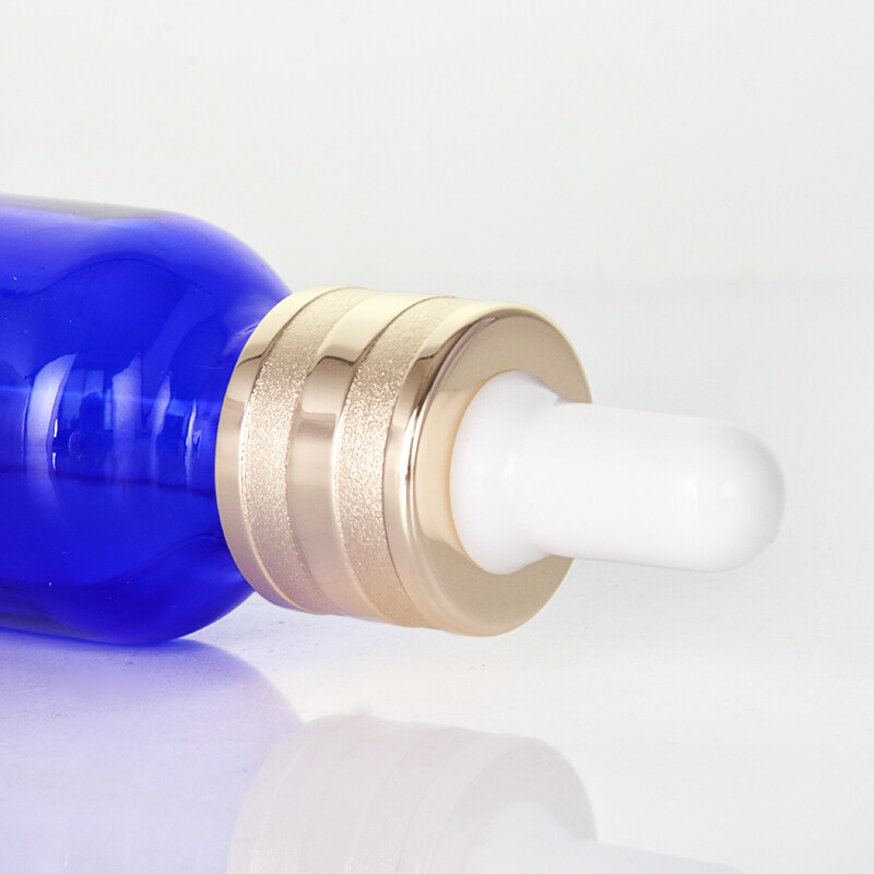 Ready to ship 30ml round shape blue glass bottle with luxury golden dropper for essential oil glass bottle