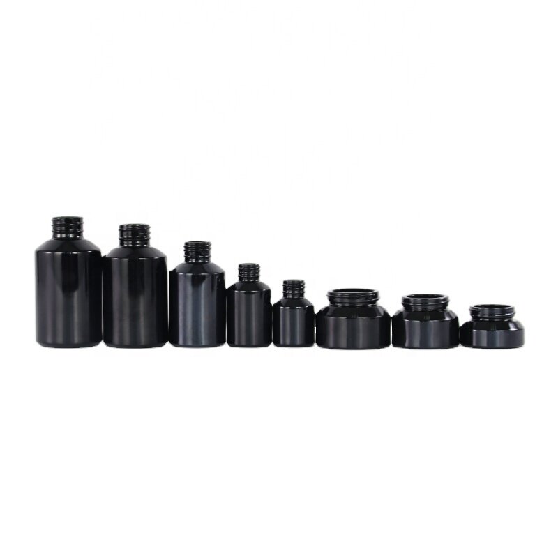 Glossy black glass bottle and jar for skin care package slant shoulder glass products with plastic lids