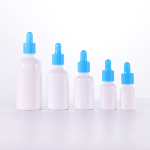 Wholesale 10ml 15ml 30ml 50ml 100ml empty opal white  glass dropper bottles with blue lids for serum essential oils aromatherapy