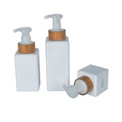 Gut zu verkaufende weiße PET-Plastikflasche mit Bambuspumpe für Shampoo