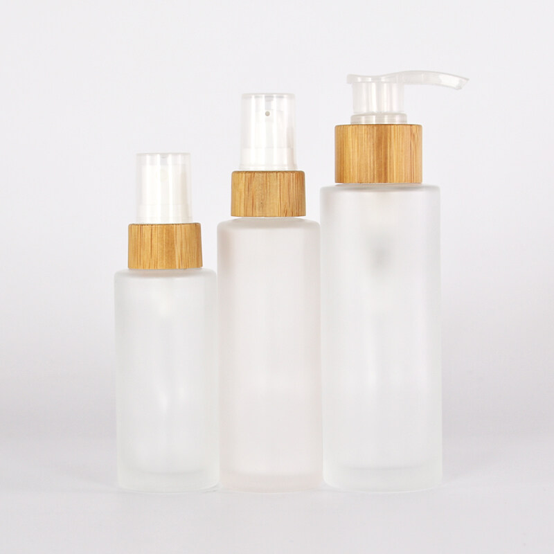Cosmetic packaging flat shoulder clear frosted glass pump bottle with Bamboo wooden cap 30ml 50ml 100ml 120ml