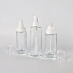 New Glass bottles with pump cap for cosmetic skincare transparent glass bottles  empty cosmetic packages with thick bottom