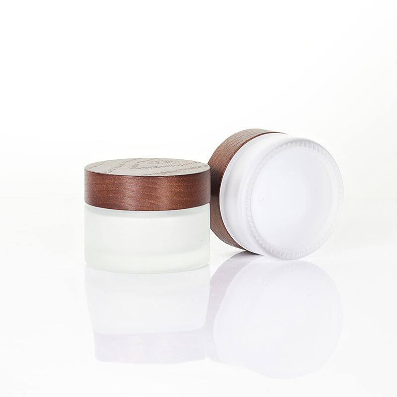Wholesale Frosted Glass Cosmetic Bamboo Cap Bottle With Ash tree wooden Spray lid Glass Pump Bottles for Cosmetics