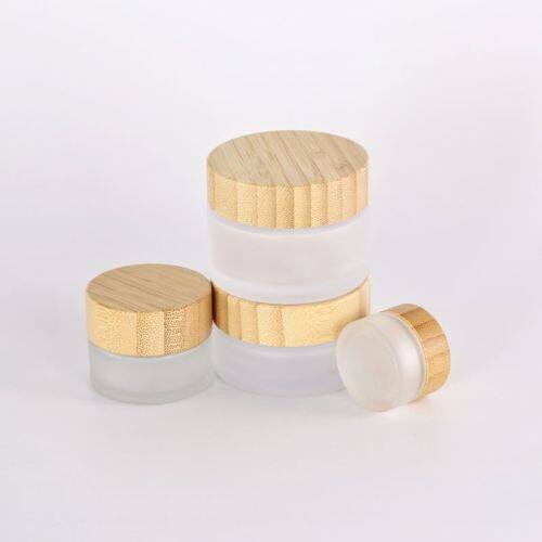 Wholesale hot 100% organic glass jar with bamboo lid/ bamboo glass cream jar for cosmetics