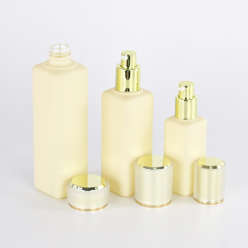 High quality painting cosmestic packaging glass bottle set luxury Golden Cover