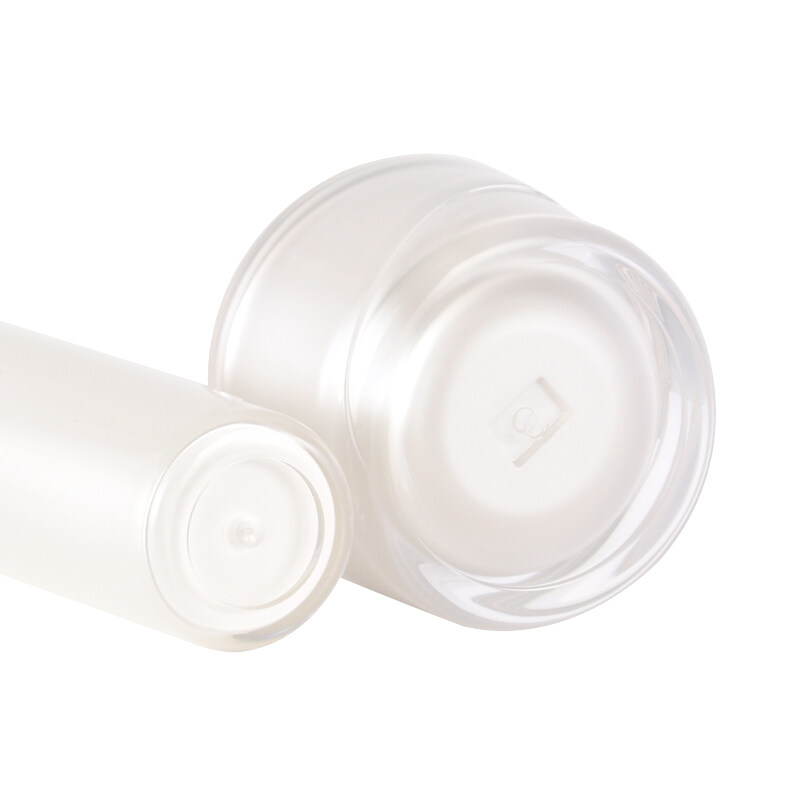 White plastic acrylic cosmetic packaging lotion bottle and cream jar