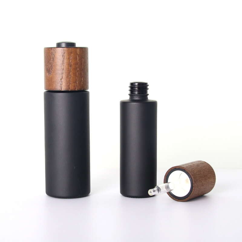 60ml frosted opaque black glass bottle with ashtree wooden cap for skin care packaging
