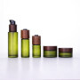 30ml 50ml 100ml 30g 50g olive green colored lotion bottles and jar with painting color ash tree wooden lid for cosmetic