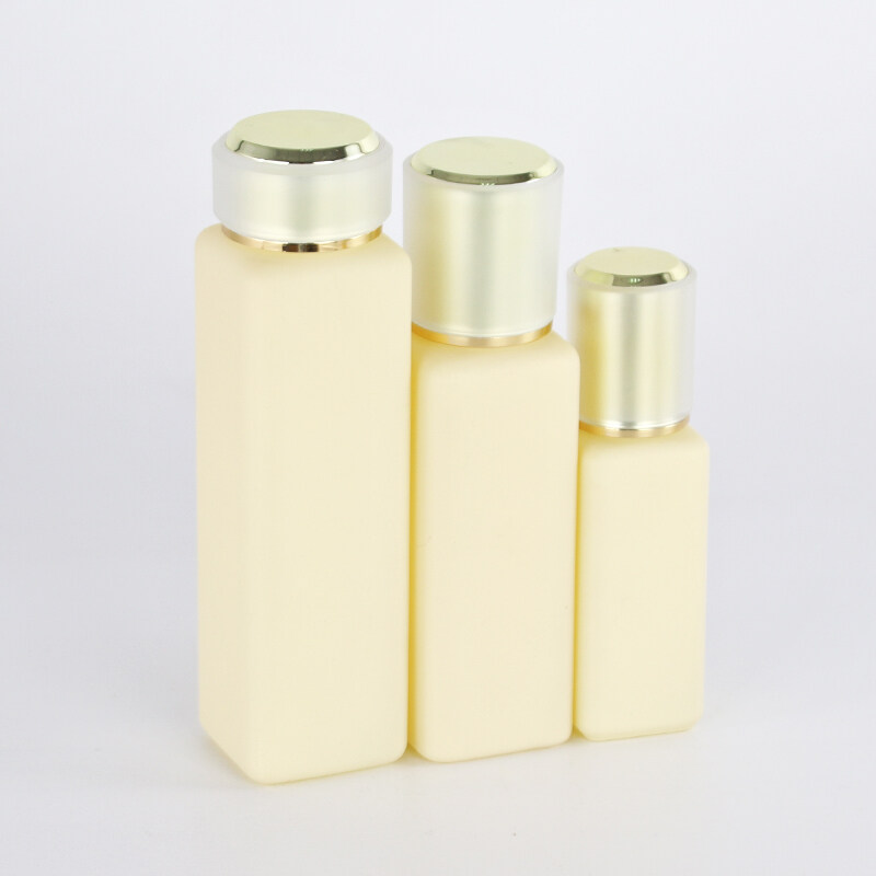 30ml 100ml 150ml customized  glass bottle high quality golden lotion pump  30g 50g glass cream jar