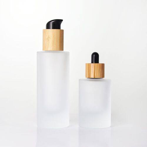 Professional supplier Glass Pump Dropper Bottle Face Skin Care Packaging Cosmetic Pump Serum Bottle 30ml With Bamboo Lid