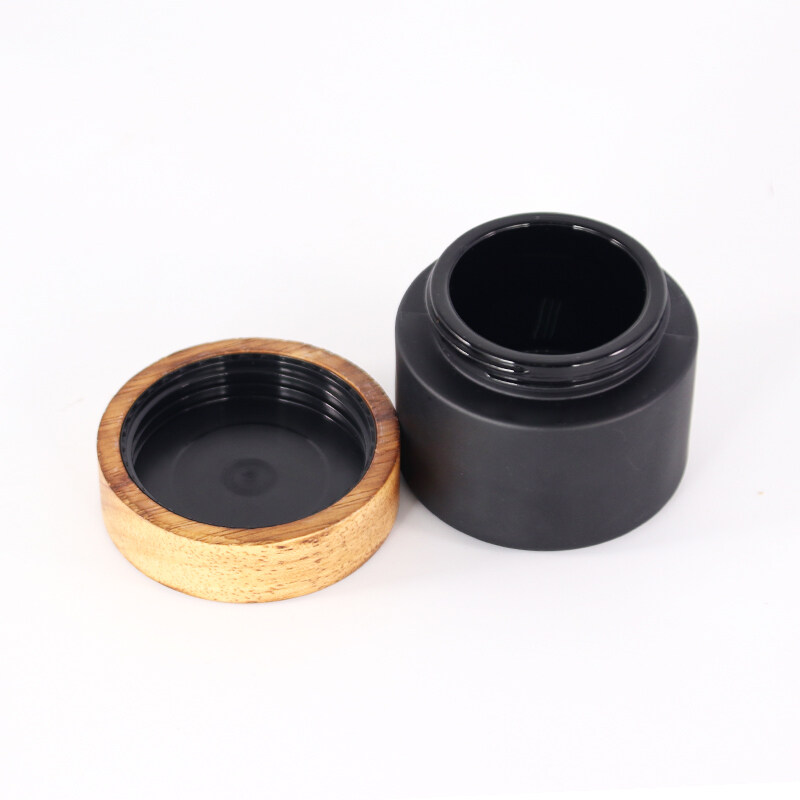hot concentrate matte black skin beauty wood cover bamboo glass jar with bamboo wooden CR screw lid child resistant packaging