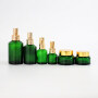 Factory green sloping shoulder glass lotion pump bottle and cream glass jar green glass bottle and jar
