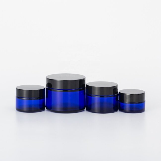 Blue glass jar for cream classic glass jar with black plastic lid