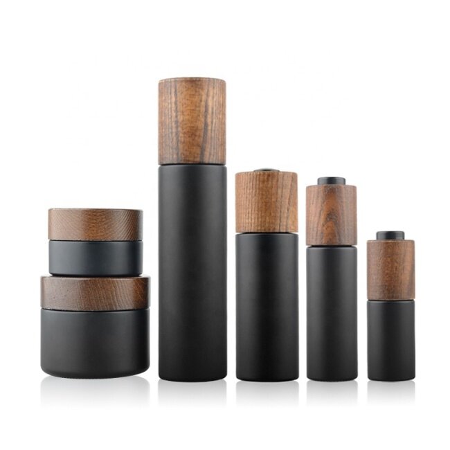 New Developed Wooden Bamboo Cap Round Dark Violet Glass Bottle with lotion pump