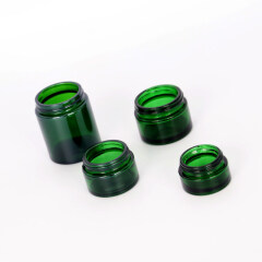 20g 30g 50g 100g high quality round green glass jar cosmetic container with black plastic cap