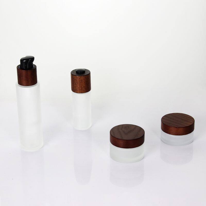 Wholesale Frosted Glass Cosmetic Bamboo Cap Bottle With Ash tree wooden Spray lid Glass Pump Bottles for Cosmetics