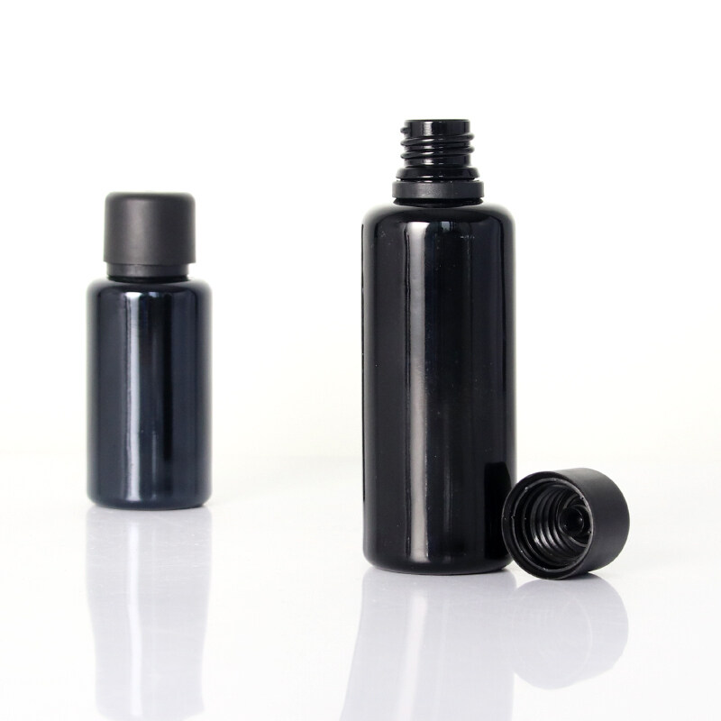 opaque black glass bottle with child resistant cap