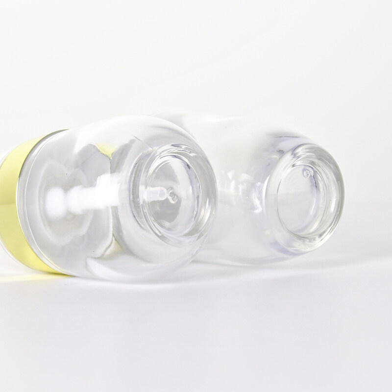 Egg-shaped transparent glass empty bottle press type lotion dispensing spray bottle