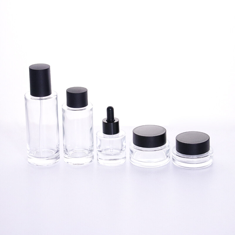 Luxury 30ml 120ml 150ml Clear Glass Bottles with frosted black plastic cap 30g 50g thick bottom glass jar for cream