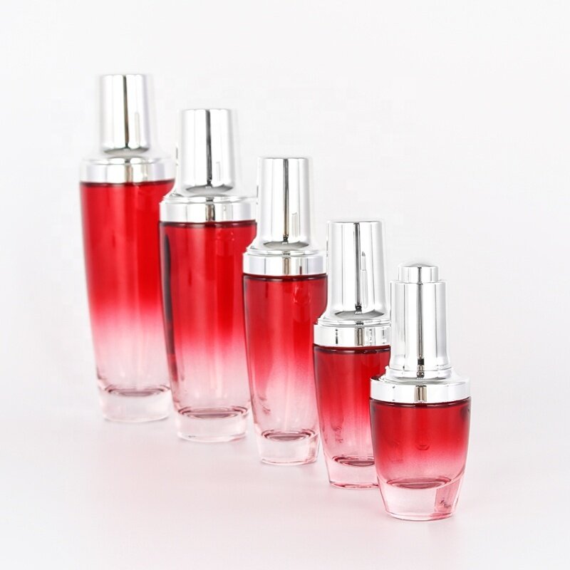 Beautiful clear red glass cosmetic bottles and jars with plastic cap new product 2020