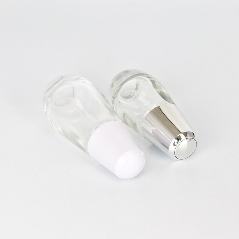 Wholesale New design 1oz 30ml clear glass serum bottle  transparent dropper bottle for skin care cosmetic packaging