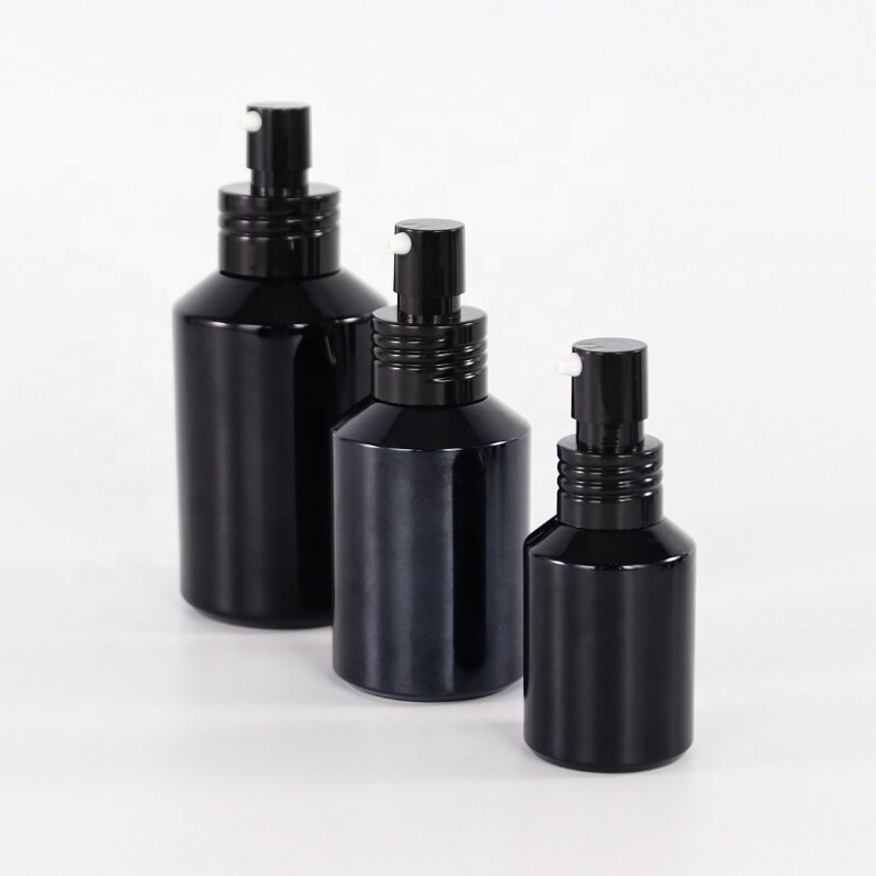 Glossy black glass bottle and jar for skin care package slant shoulder glass products with plastic lids