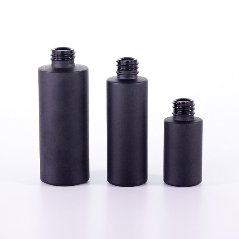 Hot selling Matte Black Glass Cosmetic Bottles Glass Serum Bottles with Black lotion pumps cosmetic packages and containers