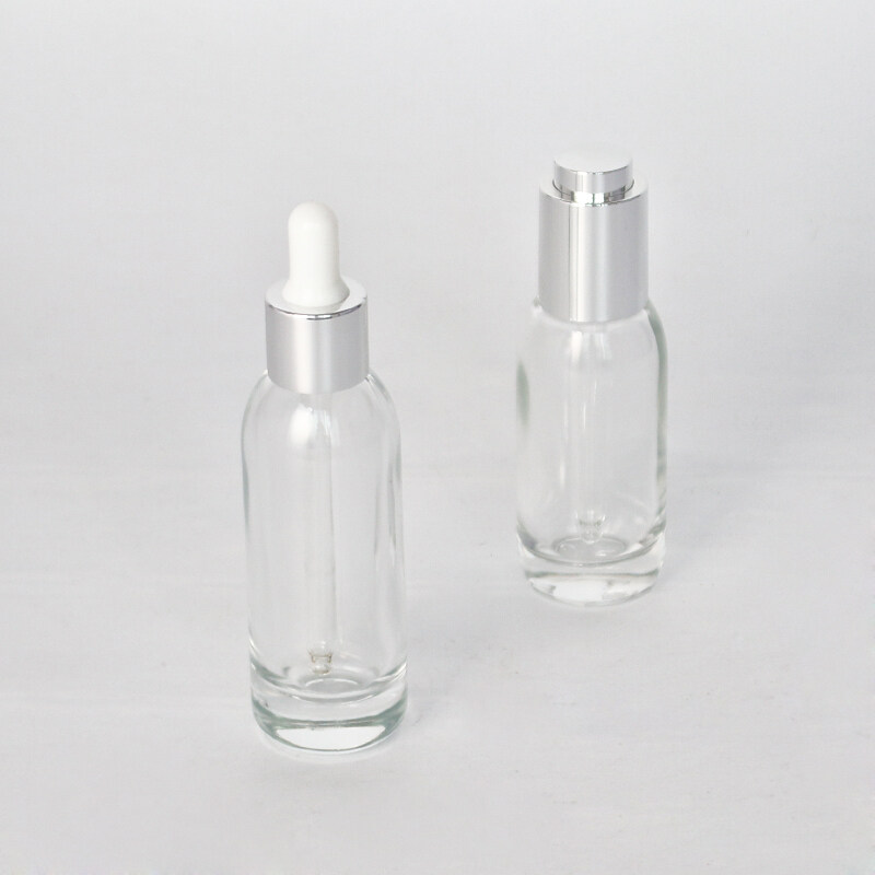 40ml irregular round shape transparent glass bottle with pressing dropper or silicone dropper