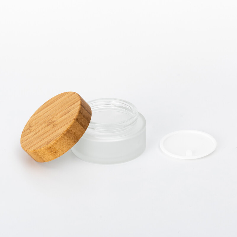Hot sale cosmetic face cream container 5ml 10ml 15ml 20ml 30ml 50ml 100ml clear glass jar with bamboo lid