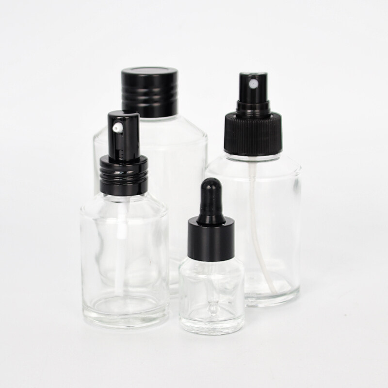 Transparent  slopping shoulder high quality glass bottle and jars with sliver lotion pump and cap